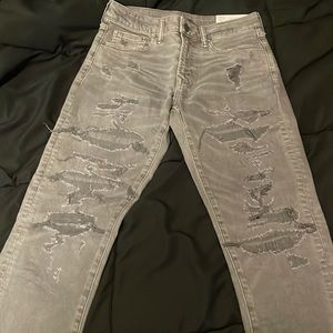 Men grey distressed American Eagle skinny jeans 28X32